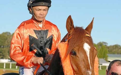 Ailing jockey Marlon Dolendo in happier times bringing another winner back to scale at Coffs Harbour. Ailing jockey Marlon Dolendo in happier times bringing another winner back to scale at Coffs Harbour.
